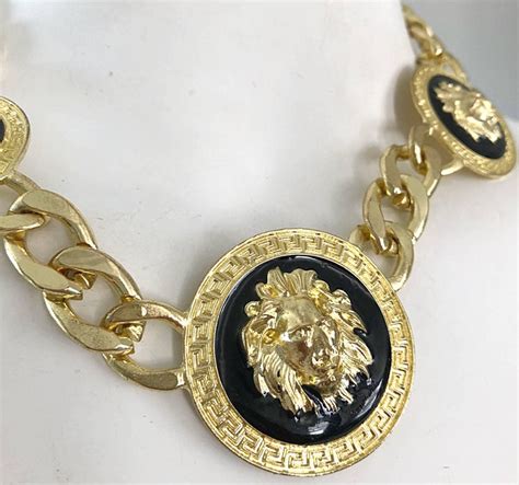 versace ring 18k|authentic versace lion necklace.